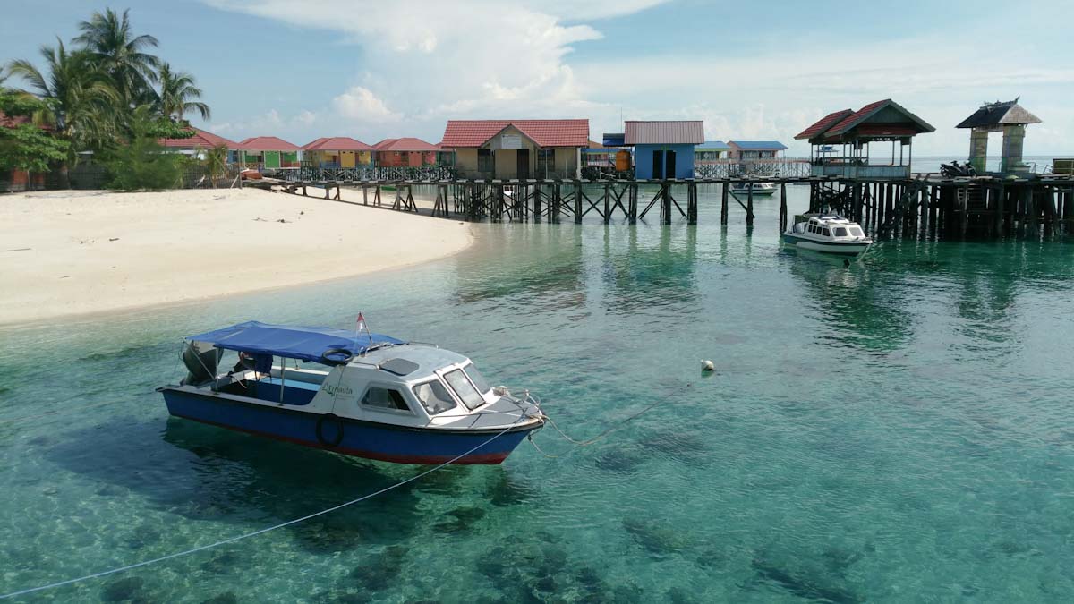 Fast boat and jetty at Derawan Islands
