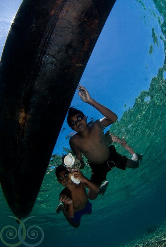 Local kid in free diving at Misool Eco Resort