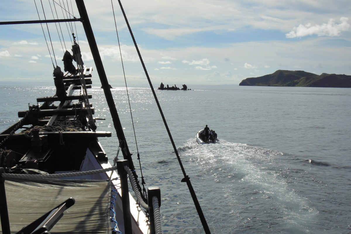 Liveaboard’s dinghies reaching Raja Ampat’s dive site