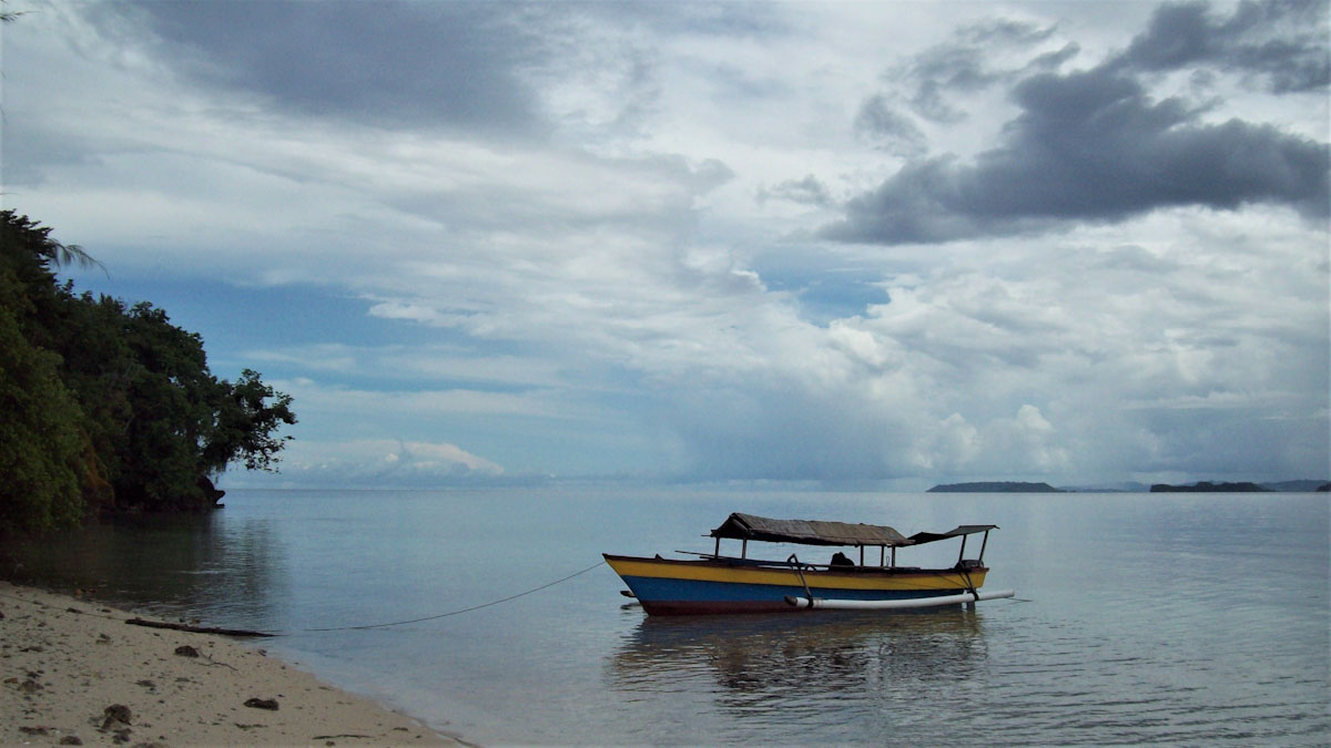 Boat on the beach of Togian Islands