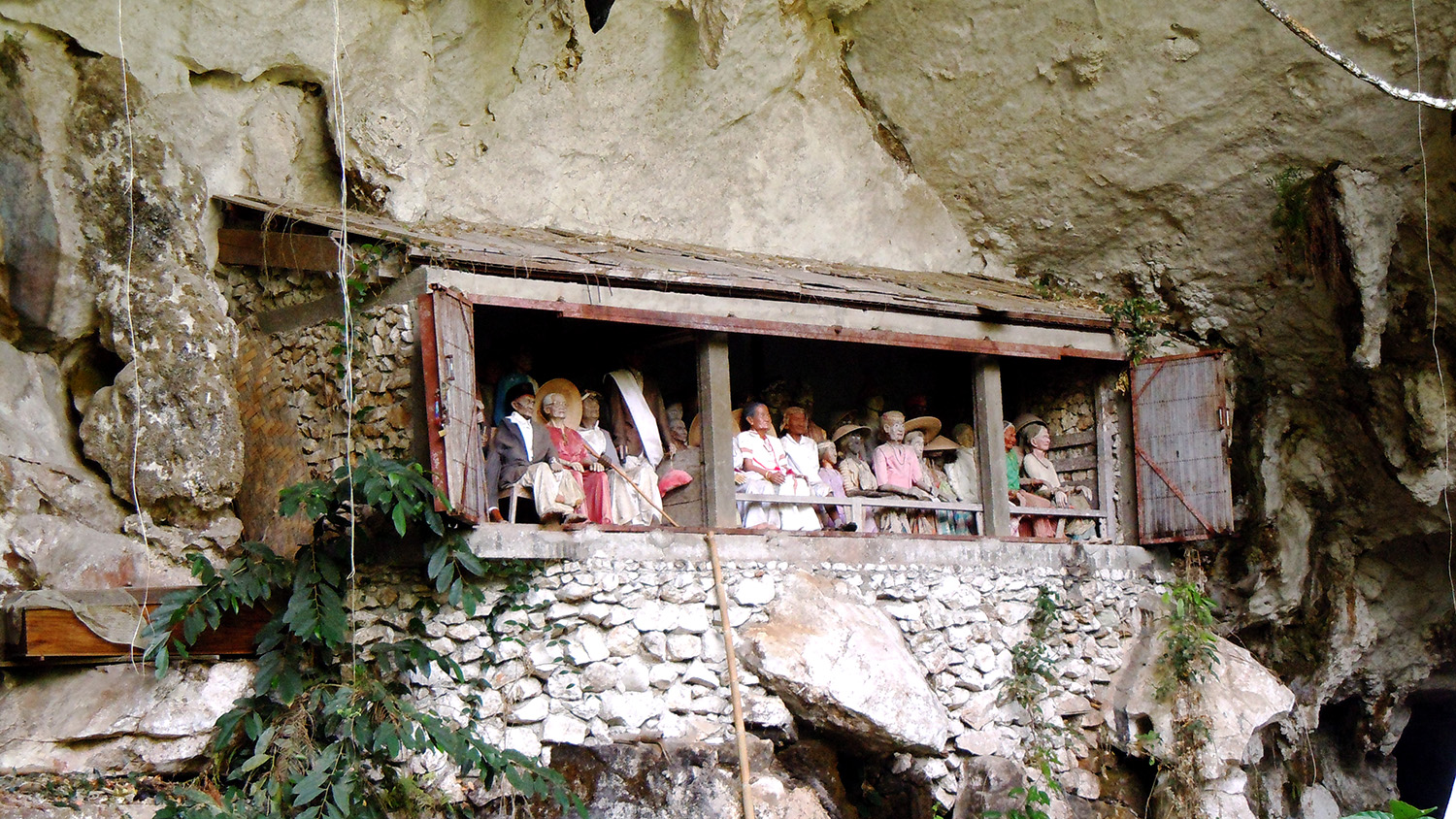 Group of tau tau on a Toraja burial site