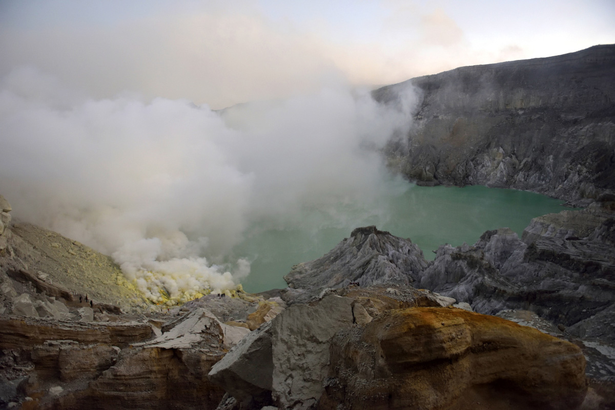 The amazing turquoise sulfur lake in the crater of the Ijen volcano