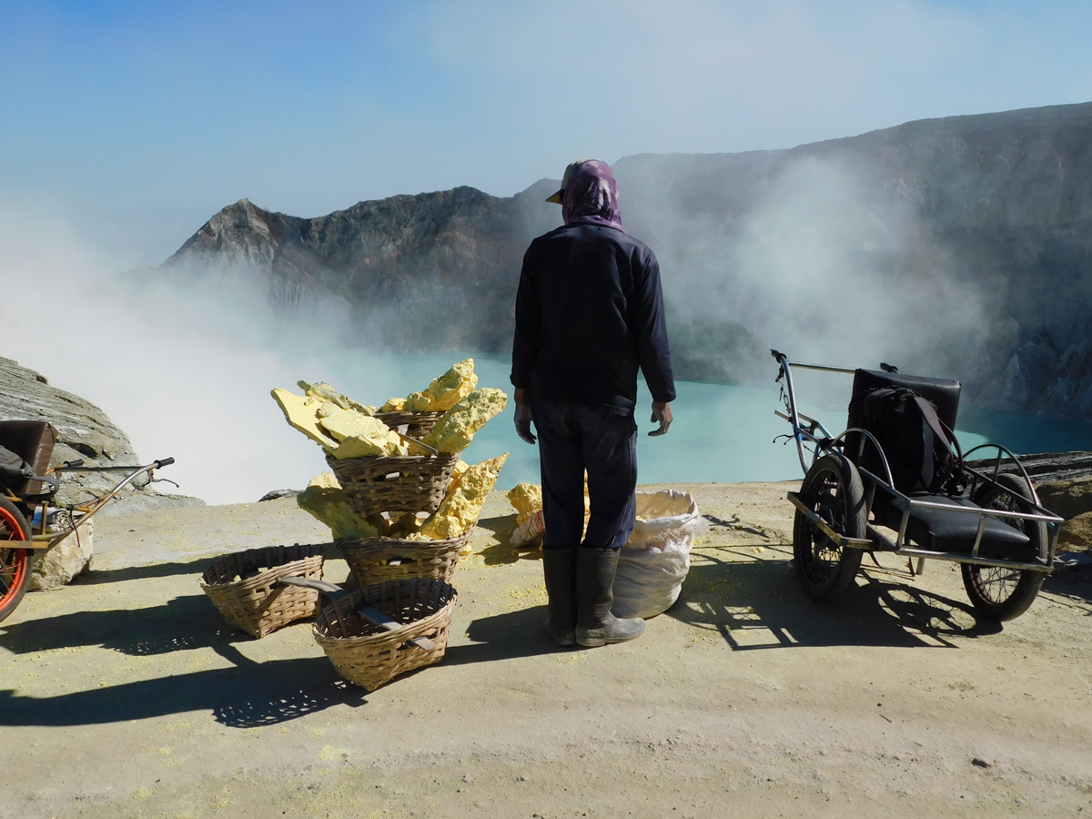 Ijen sulfur quarry and quarryman