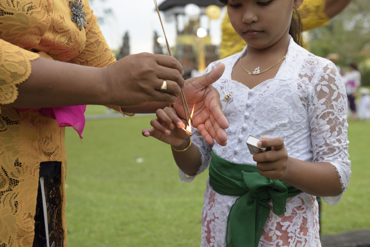 Balinese leaving a ceremony in the temple