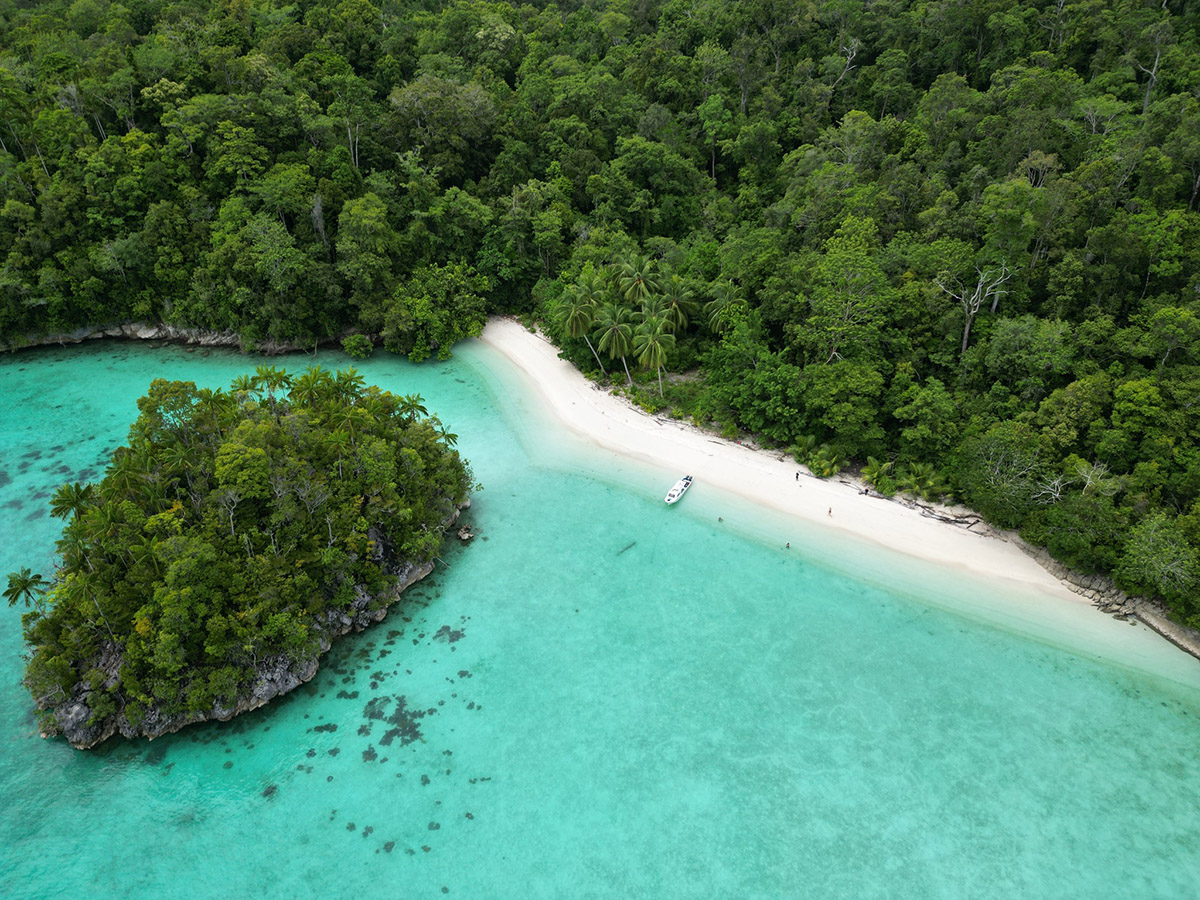 Beach resort at Triton Bay Divers